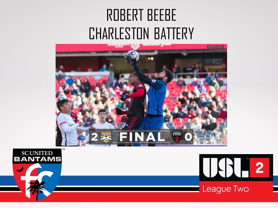 A picture of a soccer game between charleston battery and sc united