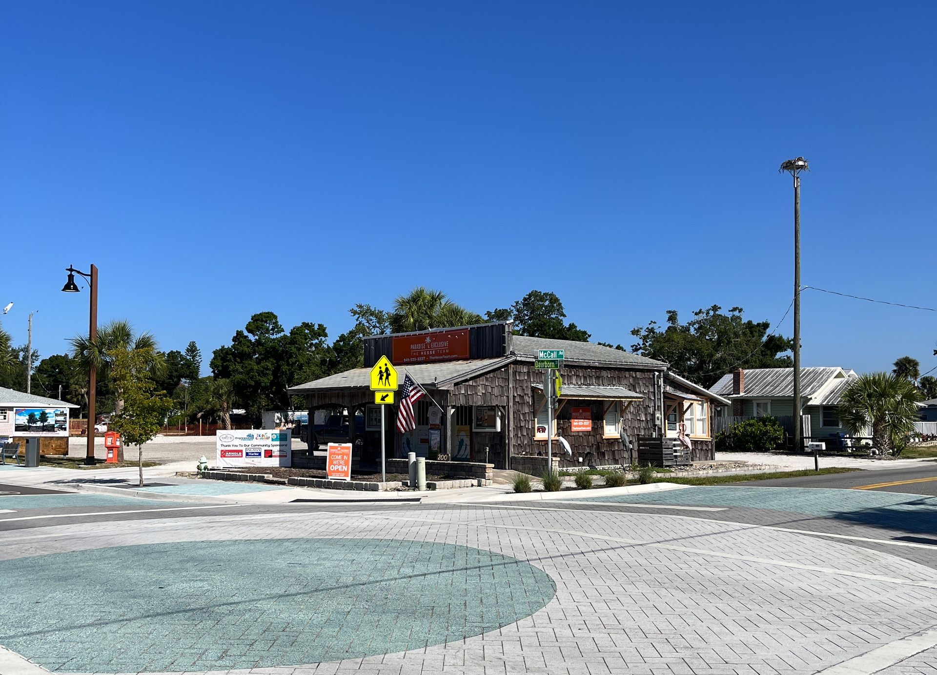 A building with a yellow sign that says a on it