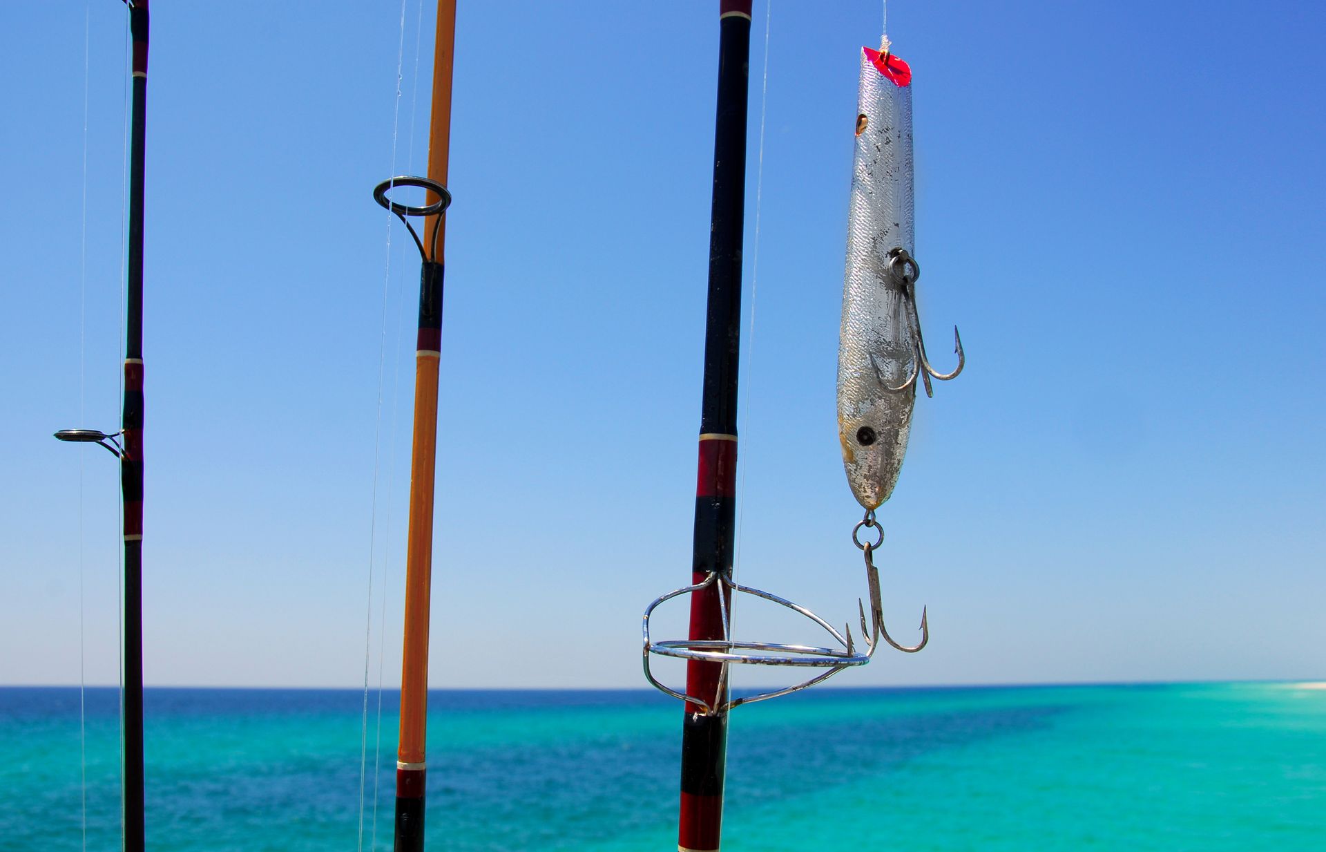 A fishing rod with a lure attached to it