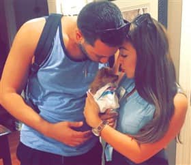new Pomeranian owners, Lisa and Joe