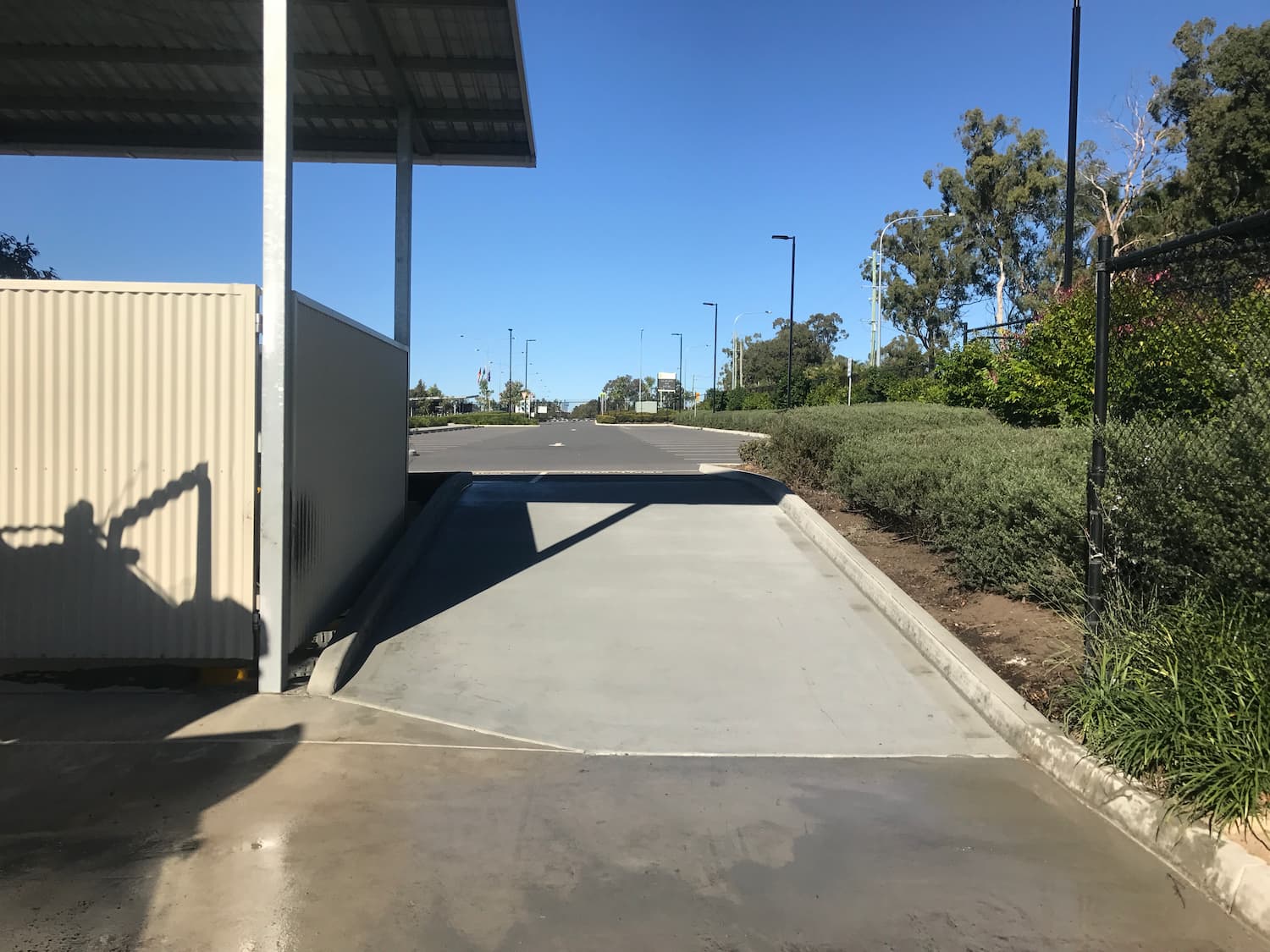 Wet Concrete on Road — Asphalt and Concreting Services and Solutions in Logan Village, QLD