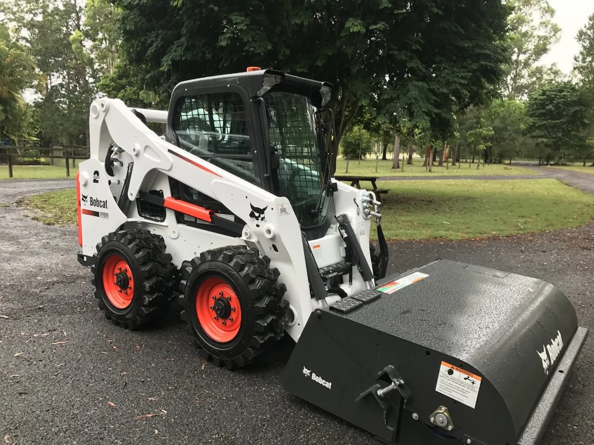White Bobcat Machinery — Asphalt and Concreting Services and Solutions in Logan Village, QLD