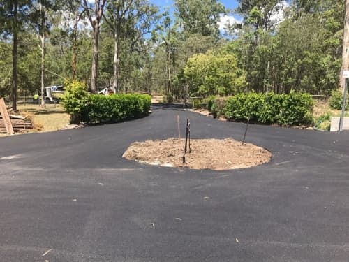 Asphalt Round-a-bout Driveway — Asphalt and Concreting Services and Solutions in Logan Village, QLD