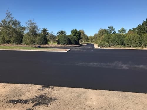 Black Asphalt Road — Asphalt and Concreting Services and Solutions in Logan Village, QLD