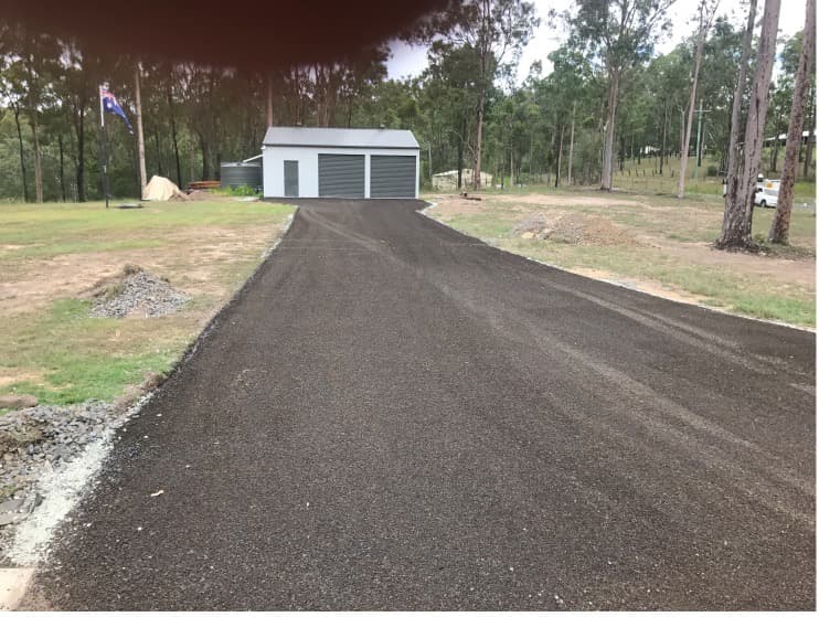 After Laying Asphalt on Driveway — Asphalt and Concreting Services and Solutions in Logan Village, QLD