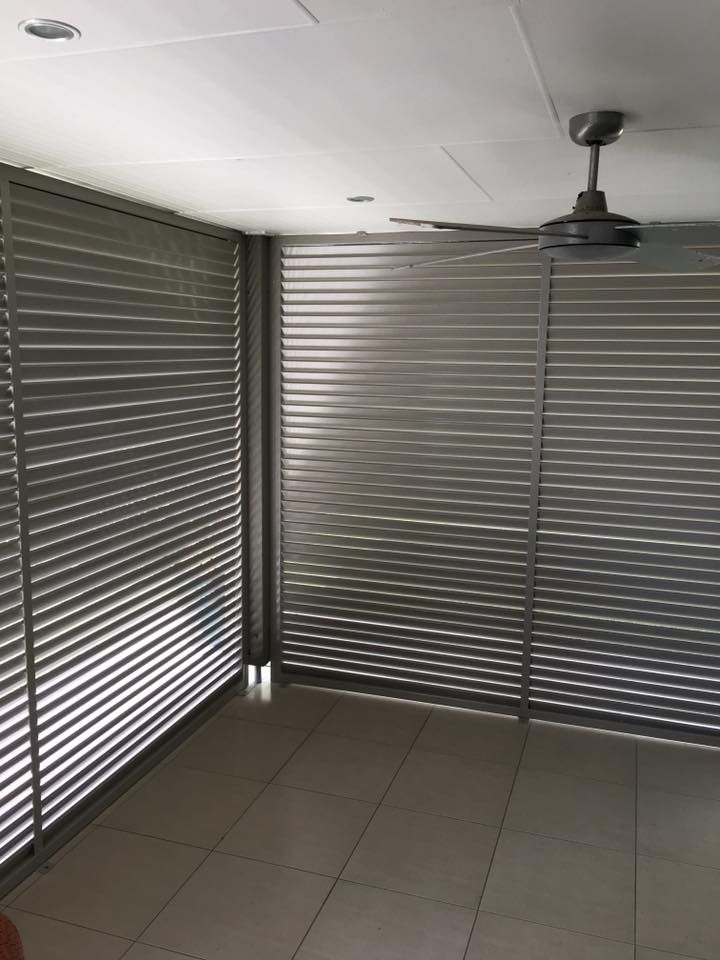 Room with gray slatted walls, white ceiling, ceiling fan, and tiled floor — Sunshine Gates in Mountain Creek, QLD