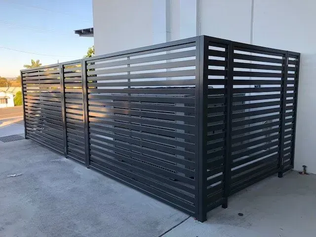 Large dark bin enclosure — Sunshine Gates in Kunda Park, QLD