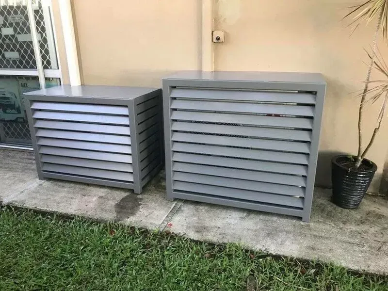 A couple of boxes sitting next to each other on a sidewalk. — Sunshine Gates in Kunda Park, QLD