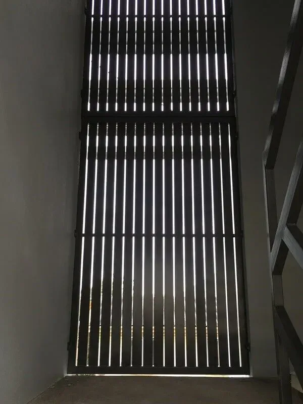 A Building With a Lot of Windows With Blinds on Them — Sunshine Gates in Kunda Park, QLD