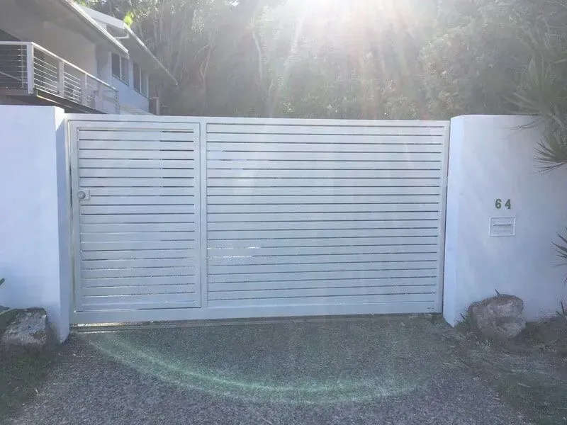 A white gate with the number 44 on it. — Sunshine Gates in Kunda Park, QLD