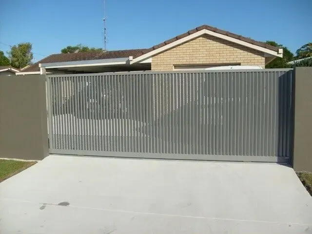 A house with a sliding gate in front of it. — Sunshine Gates in Kunda Park, QLD