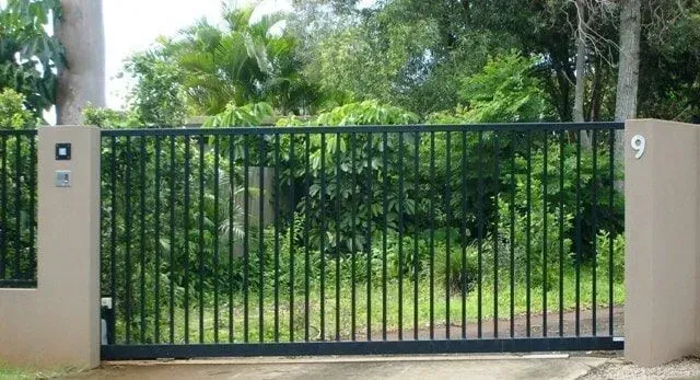 A sliding gate with the number 9 on it. — Sunshine Gates in Kunda Park, QLD