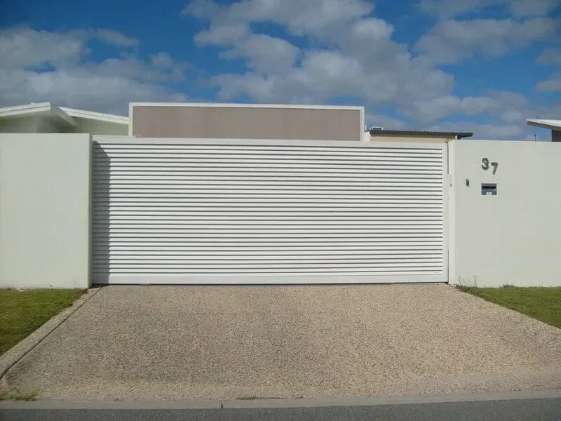 A white garage door with the number 37 on it. — Sunshine Gates in Kunda Park, QLD
