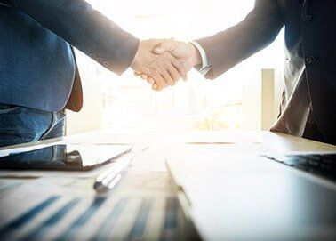 Businessmen shaking hands — Reliable Conveyancer in Parap, NT