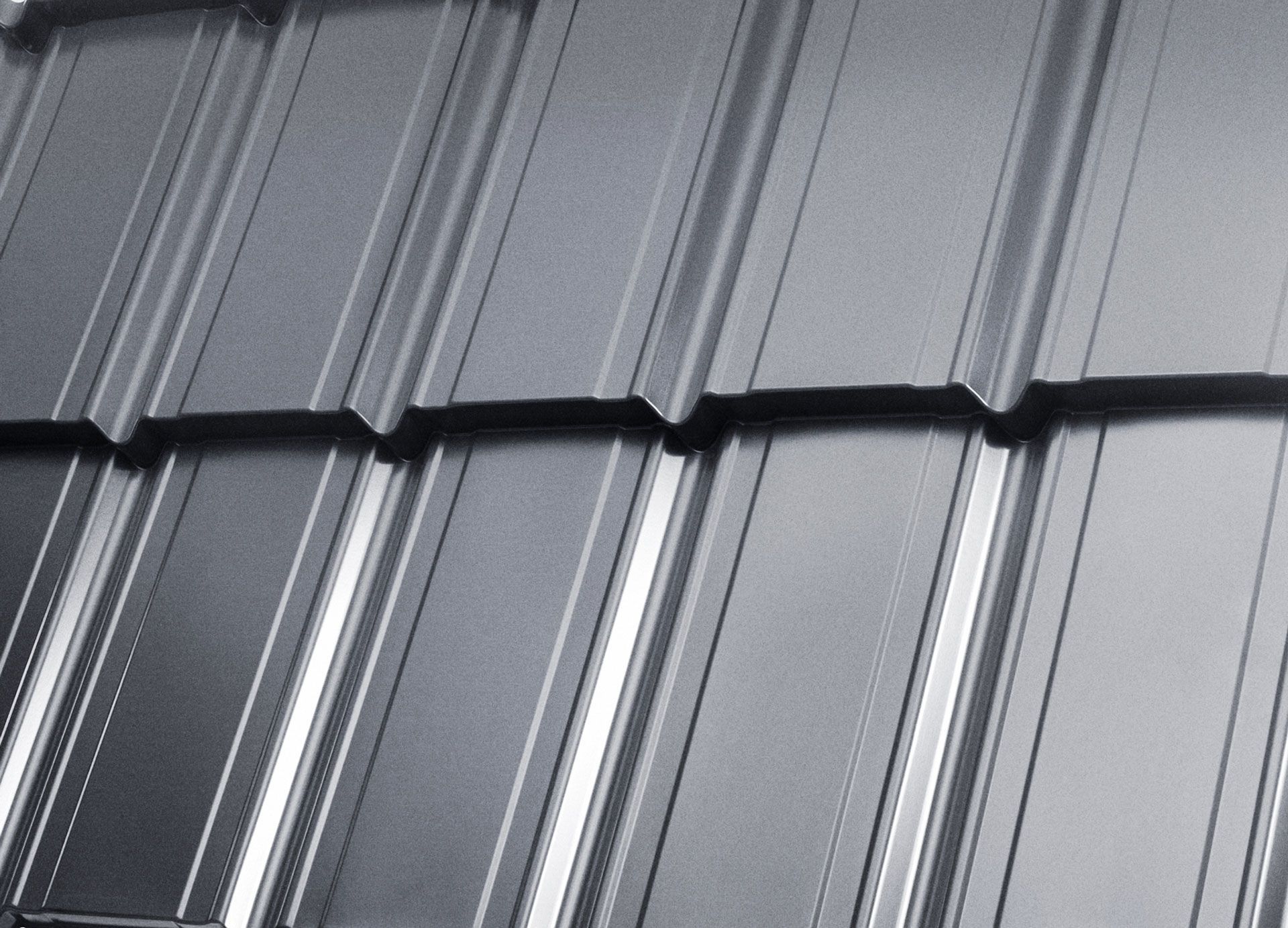 A close up of a gray metal roof