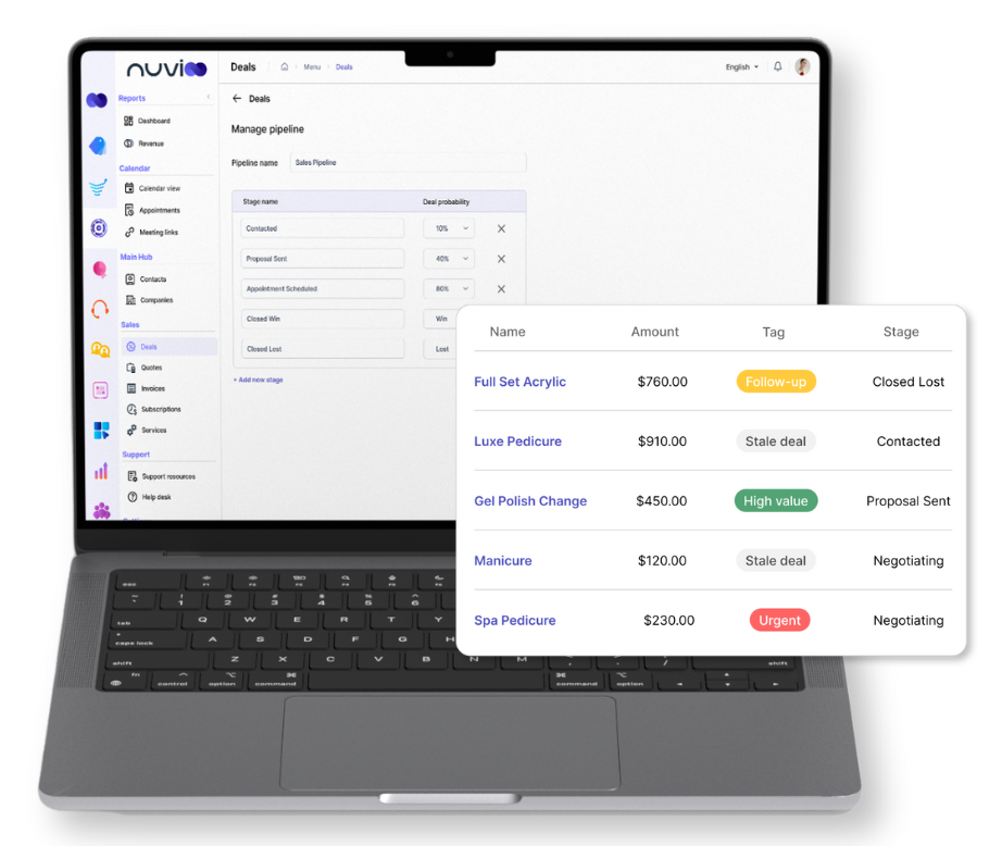 Laptop displaying a CRM dashboard with sales deals. A table lists deals, amounts, and stages.
