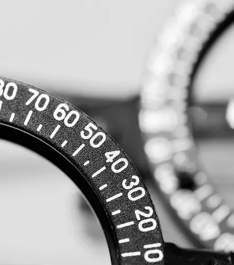 A Black And White Photo Of A Watch Face With Numbers On It — Eyedentity Optical In Earlville, QLD