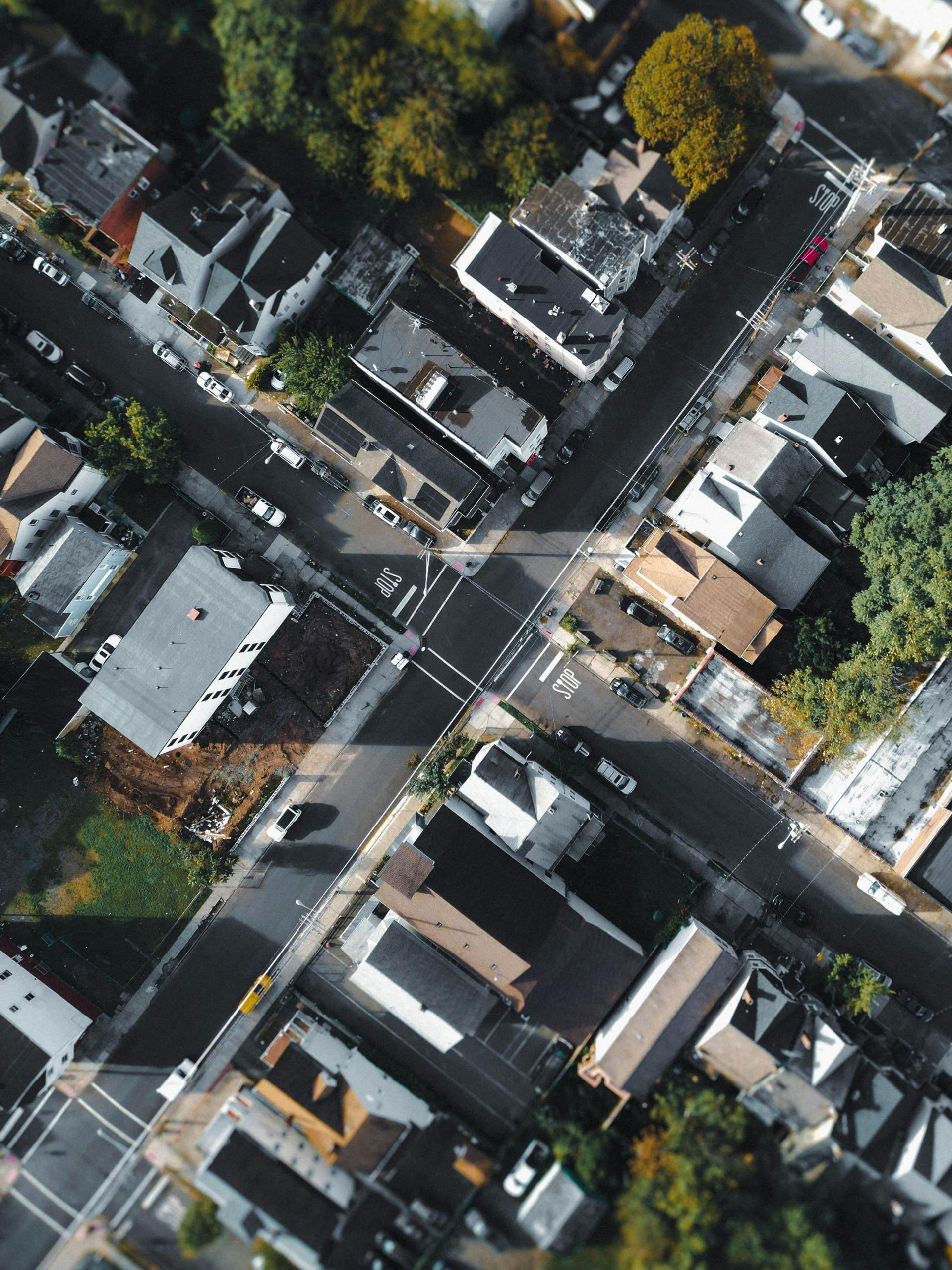 An aerial view of a residential area with lots of houses and trees