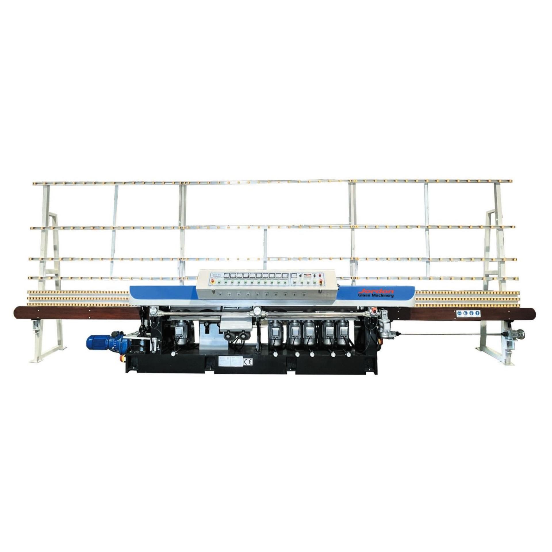A machine is sitting on top of a table with a white background.