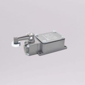 A close up of a switch on a white surface.