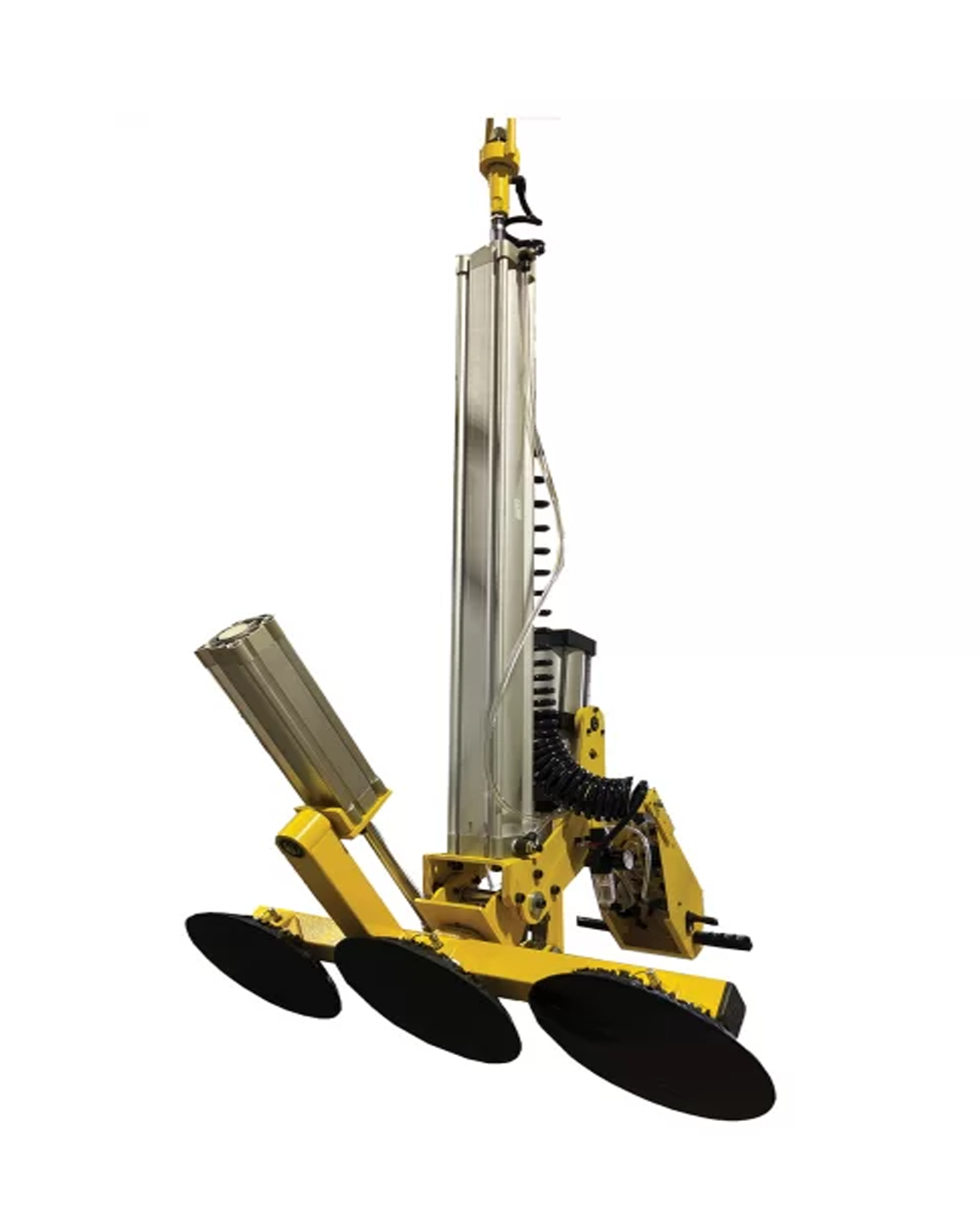 A yellow and silver machine is sitting on top of a white surface.