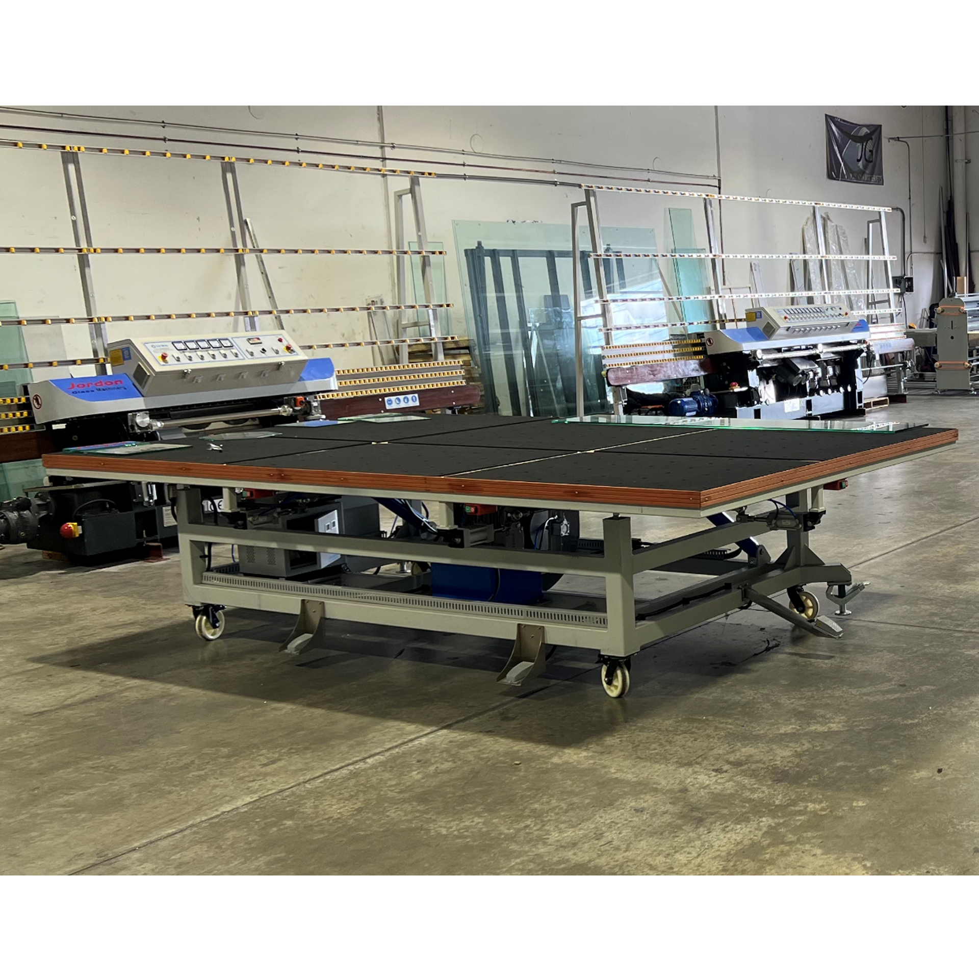 A table with a lot of glass on it in a factory
