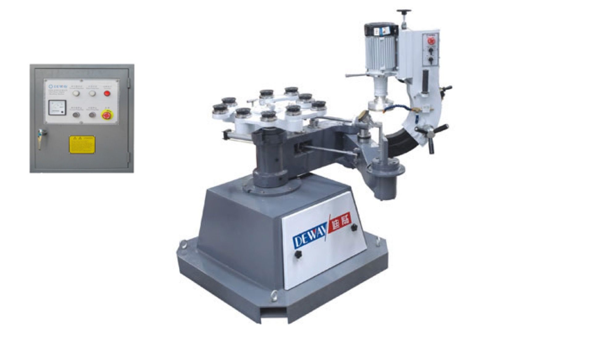 A machine is sitting on a table next to a control panel.