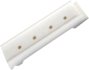 A white piece of plastic with holes in it on a white background