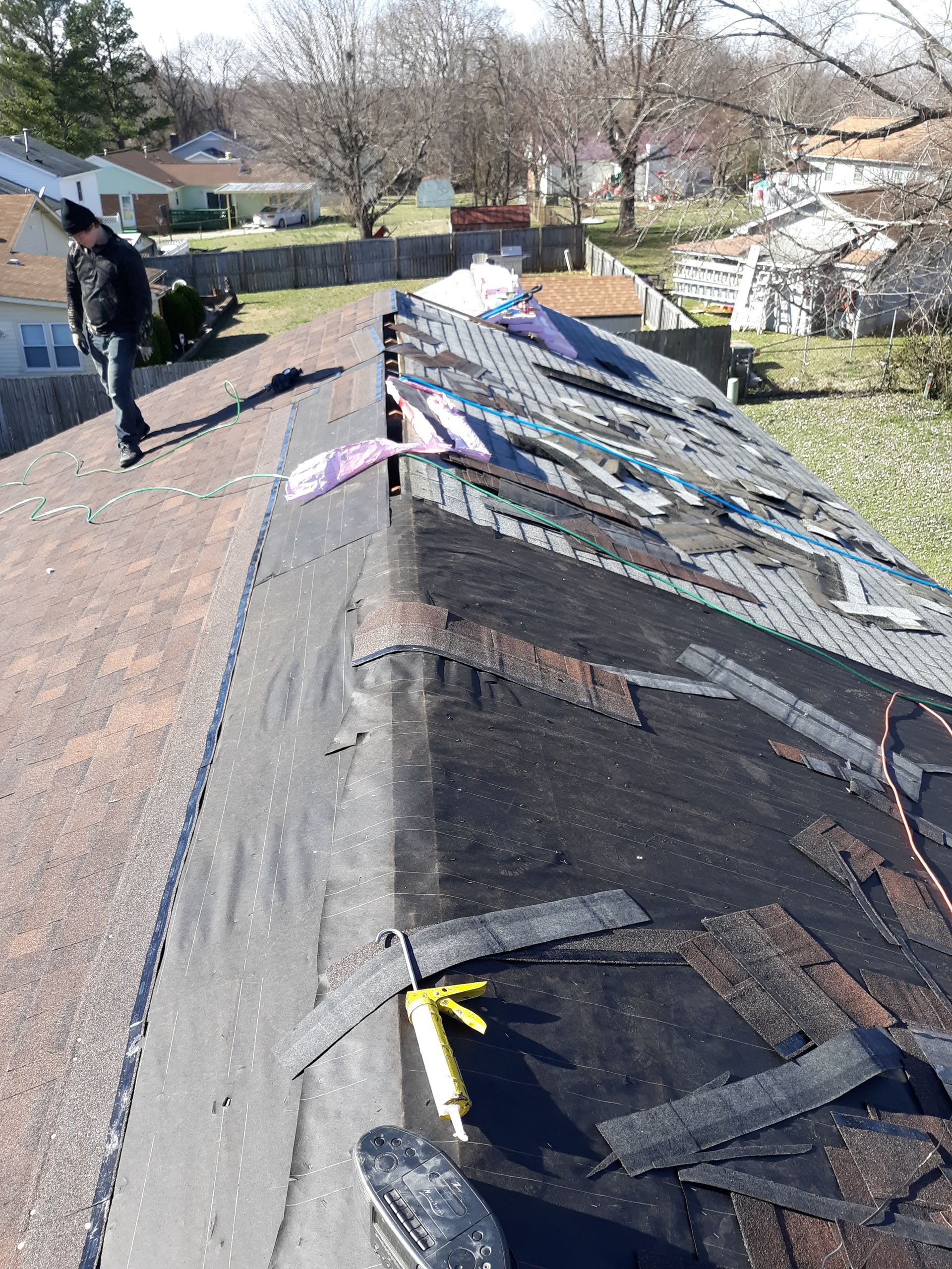 A close up of a black roof on a house.