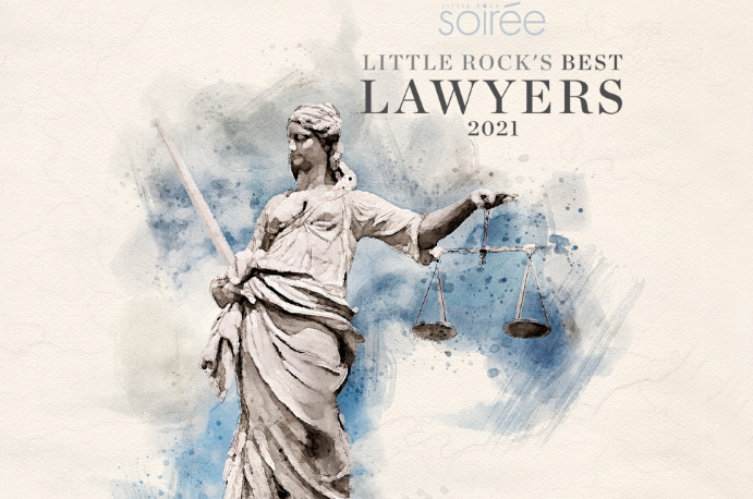 A statue of lady justice is holding a scale of justice.
