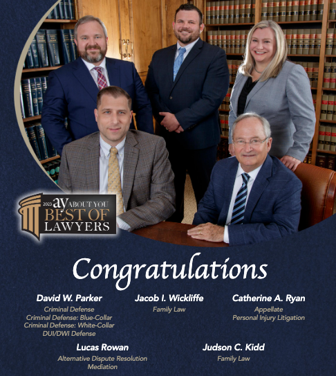 A group of lawyers posing for a picture with the words congratulations on the bottom