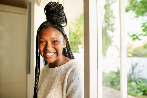 Cheerful African Teenage Girl — Morrisville, PA — Doyin Beauty Supply