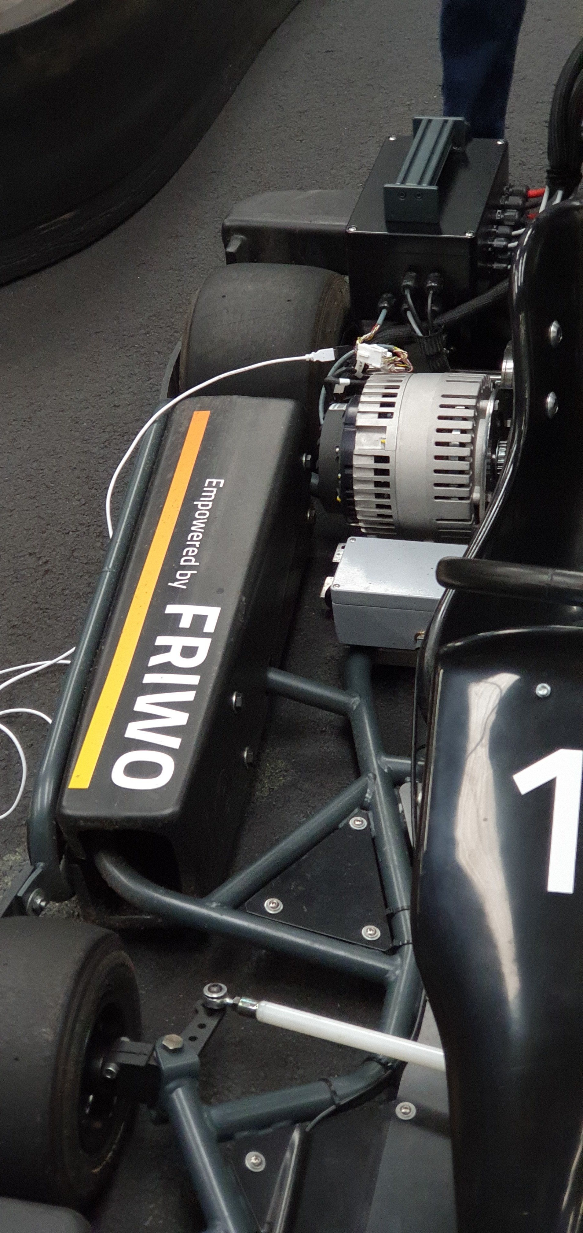 The number 1 is on the side of a race car