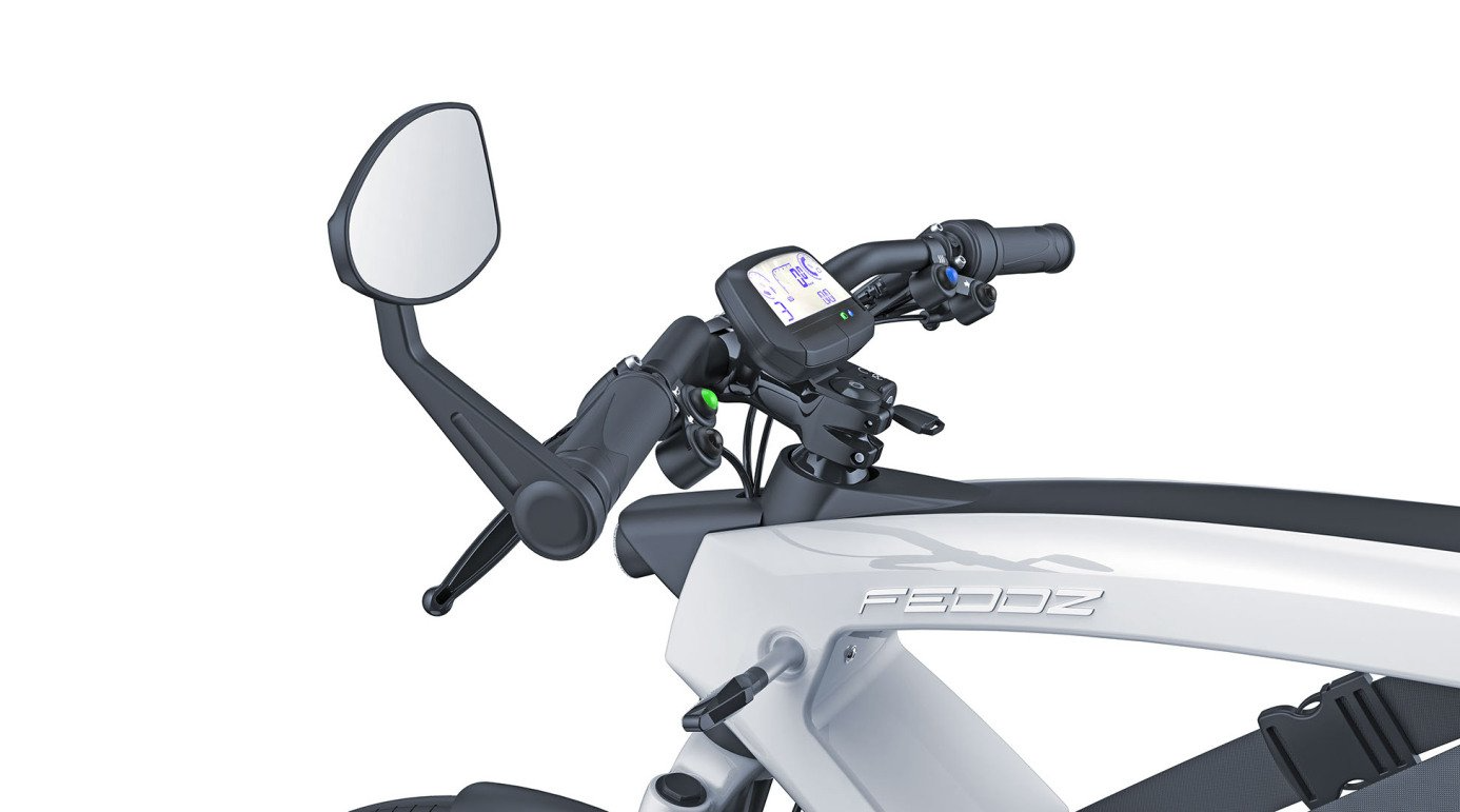 A close up of a motorcycle with a rear view mirror.