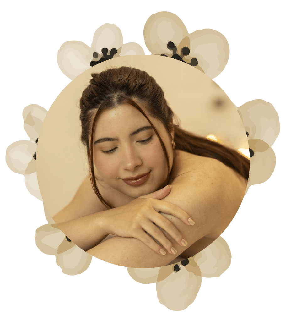 A woman is laying in a circle with her eyes closed