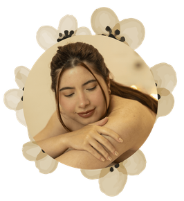 A woman is laying in a circle with her eyes closed