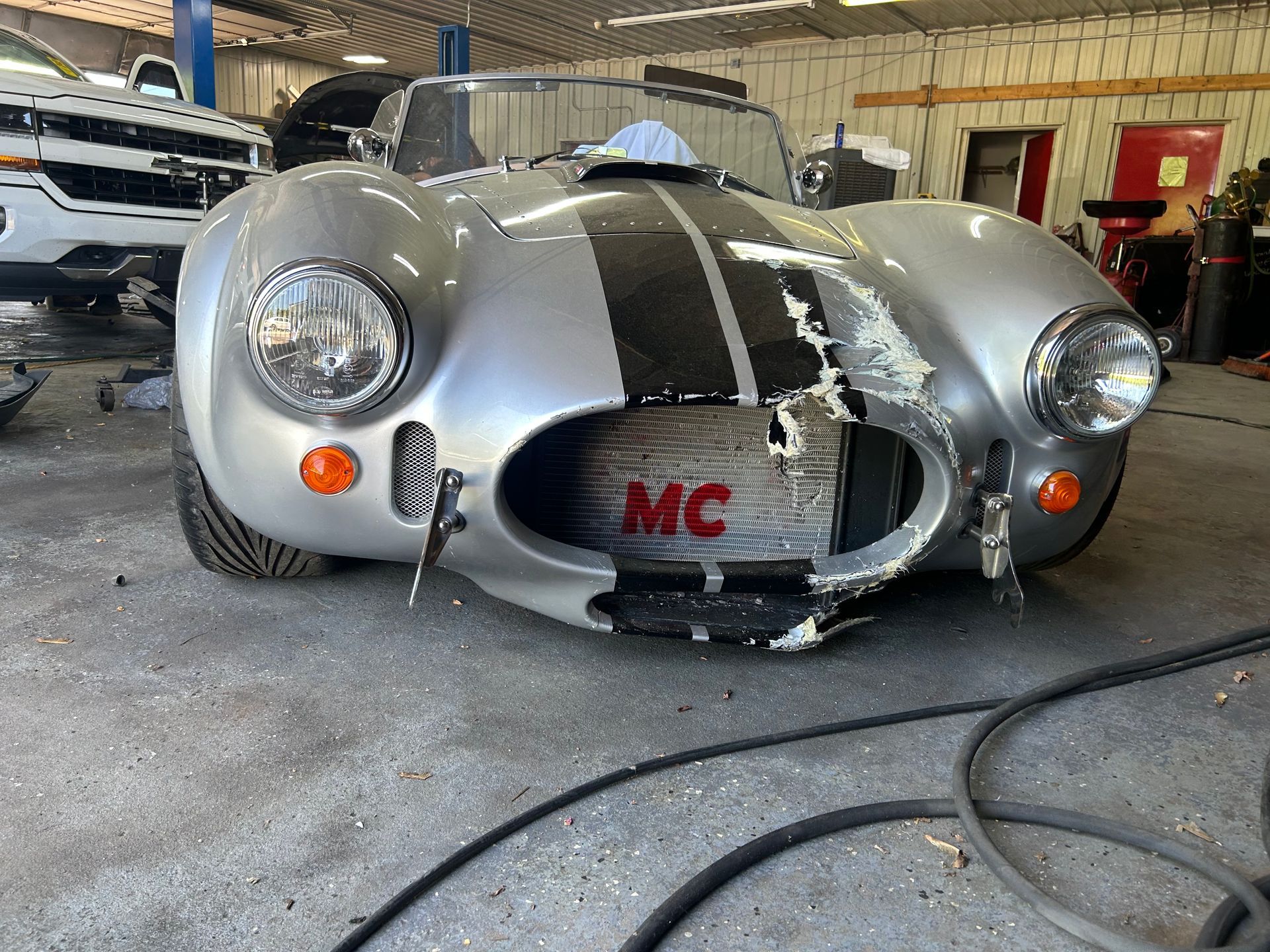 A damaged Shelby Cobra