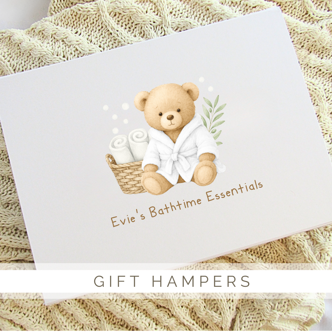 A teddy bear in a bathrobe is sitting next to a basket of towels.