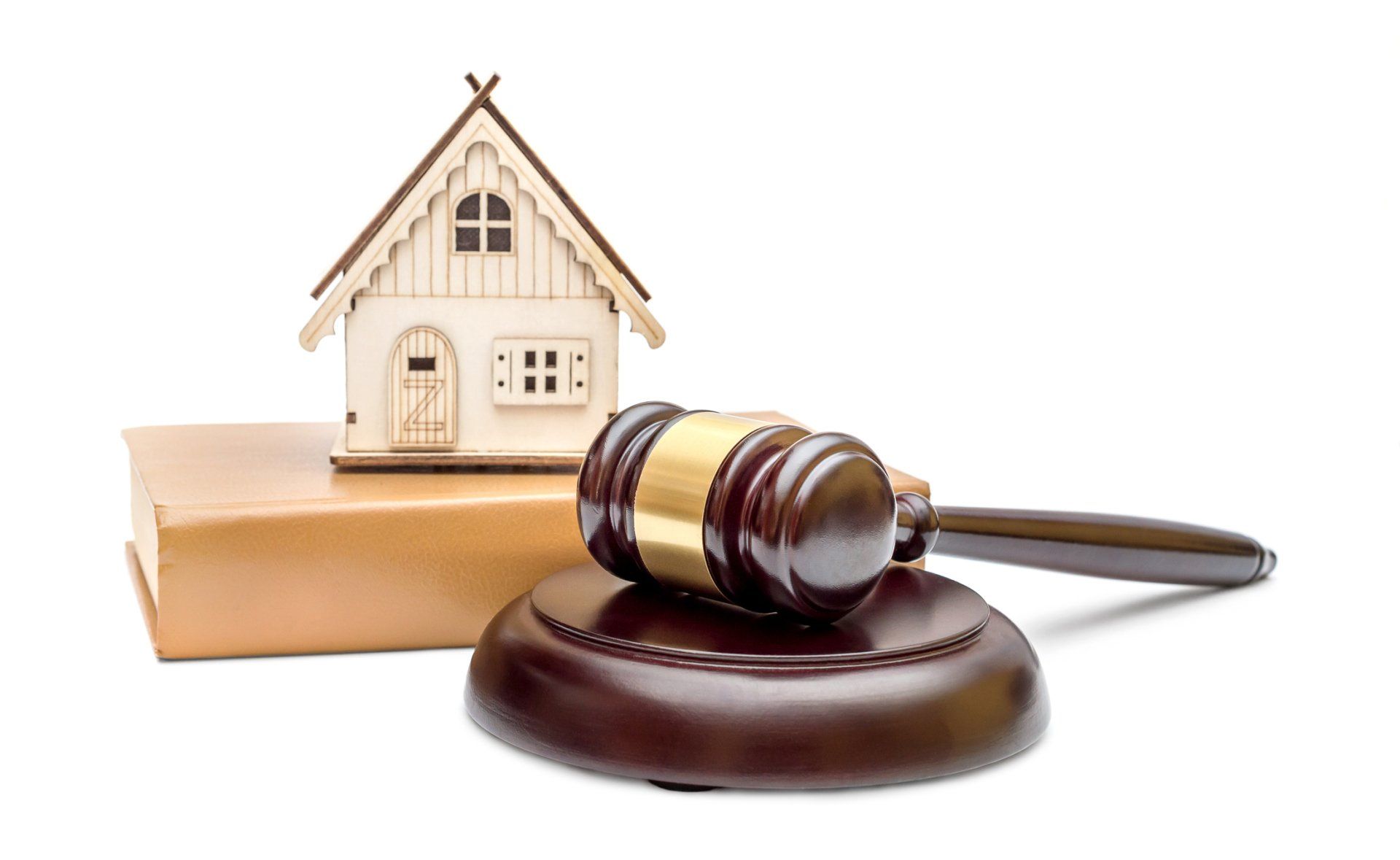 Mortgage elimination — Model of house with gavel in Lexington, OH
