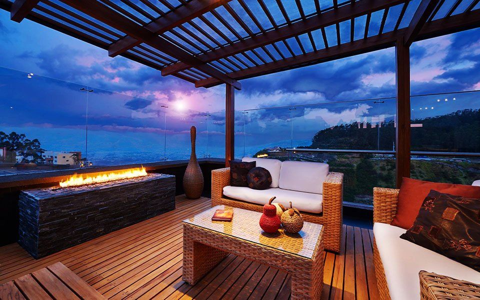 Beautiful pine terrace with rattan furniture