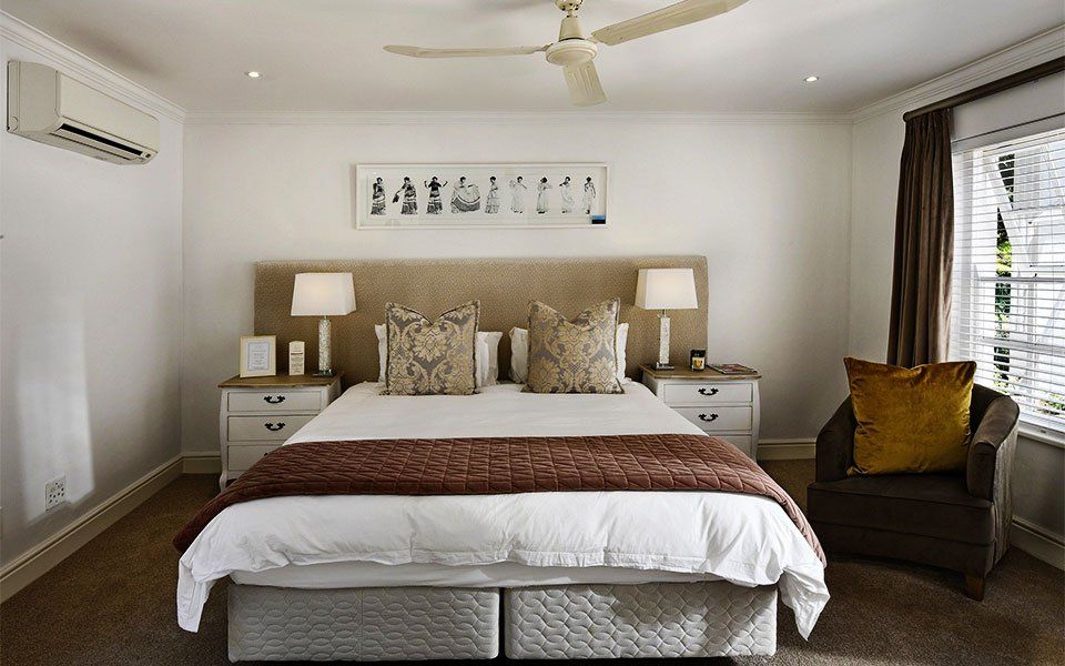Beautiful bedroom renovation tan and white eclectic