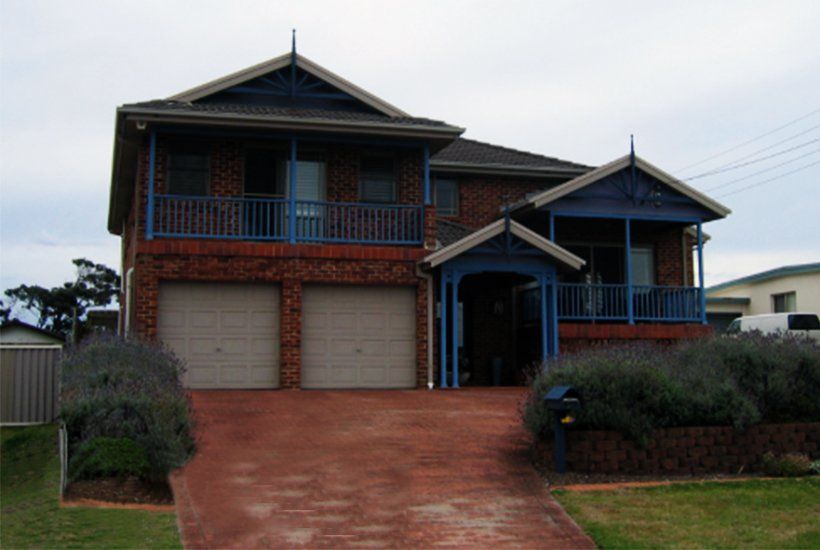 Ugly red brick house before remodel