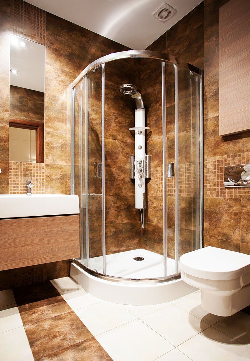 traditional cream and tan tiled renovated bathroom