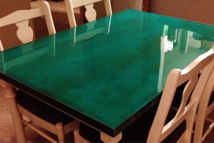Beautiful green resin table after remodel