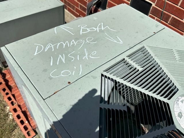 A damaged inside coil is written in white chalk