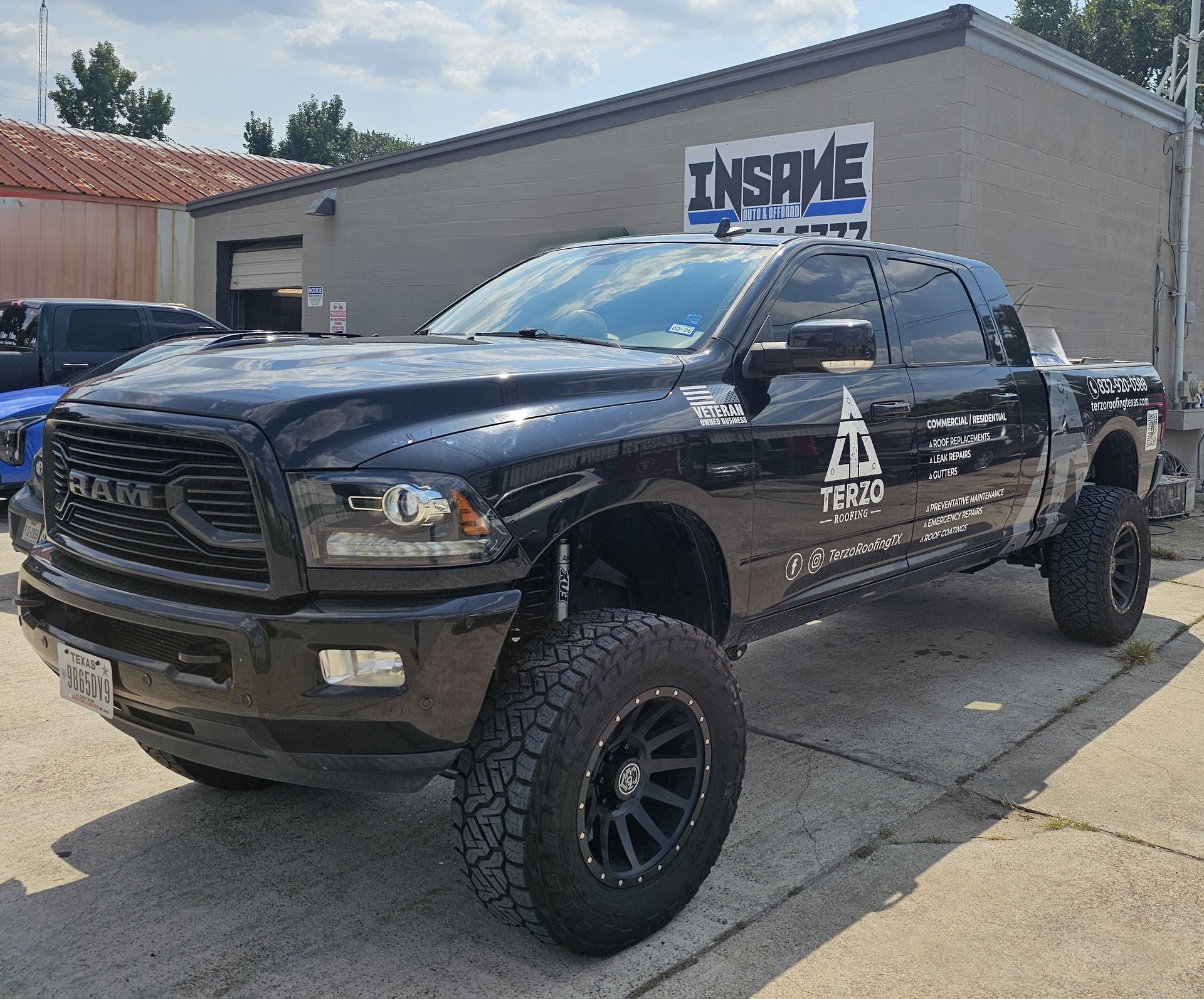 Black Ram Pickup Truck with Large Off-Road Tires | Insane Automotive and Offroad