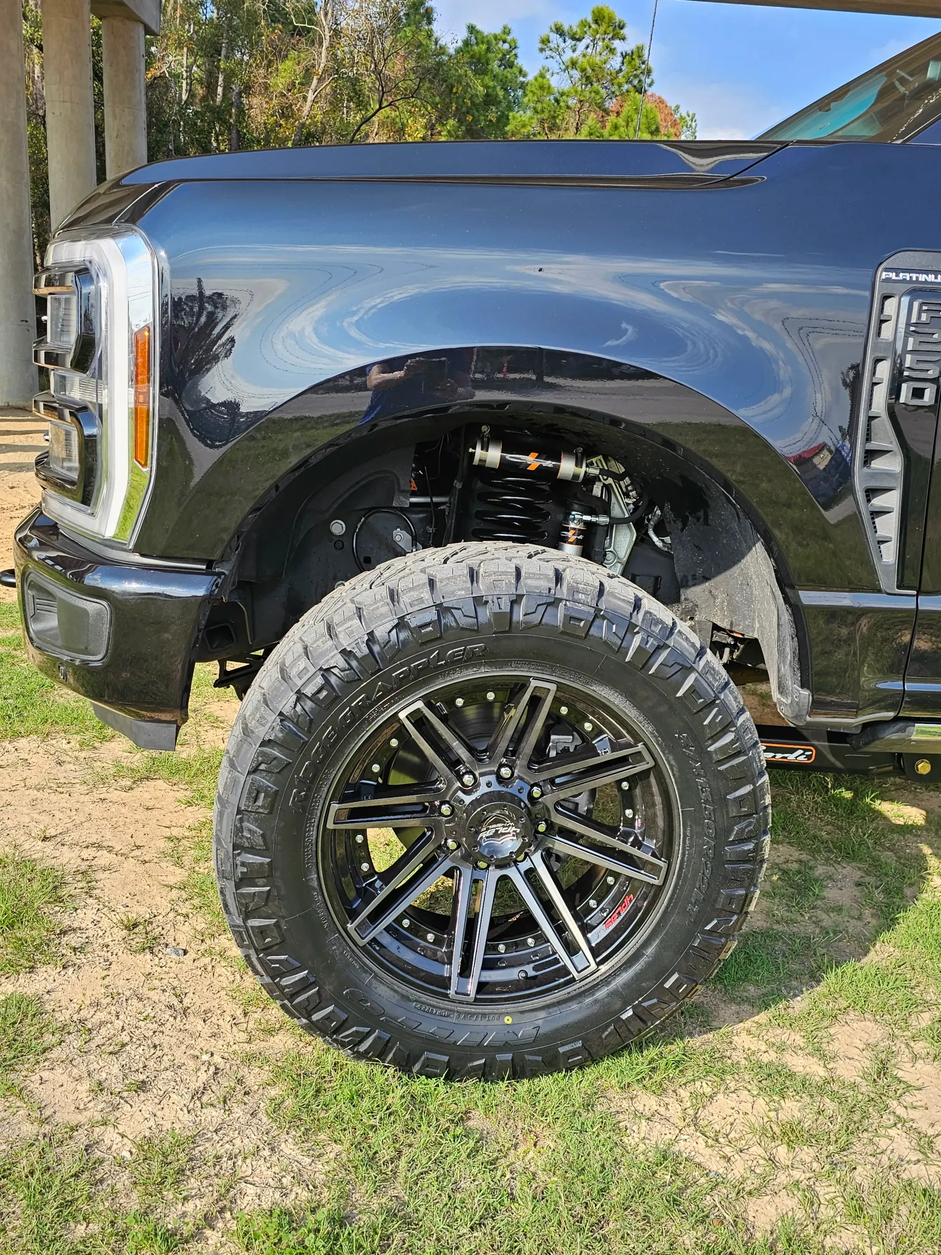Black Pickup Truck with Lifted Suspension and Large Off-Road Tires | Insane Automotive and Offroad