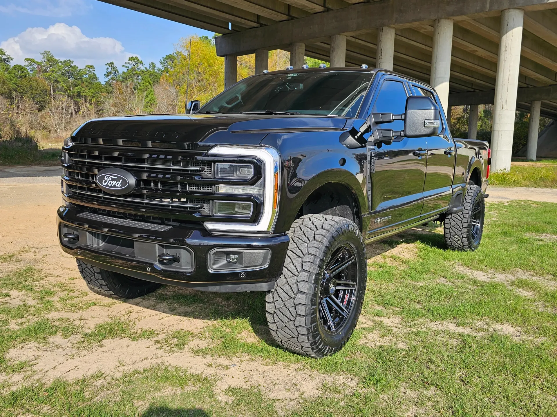 Black Ford Pickup Truck Parked on Grass | Insane Automotive and Offroad