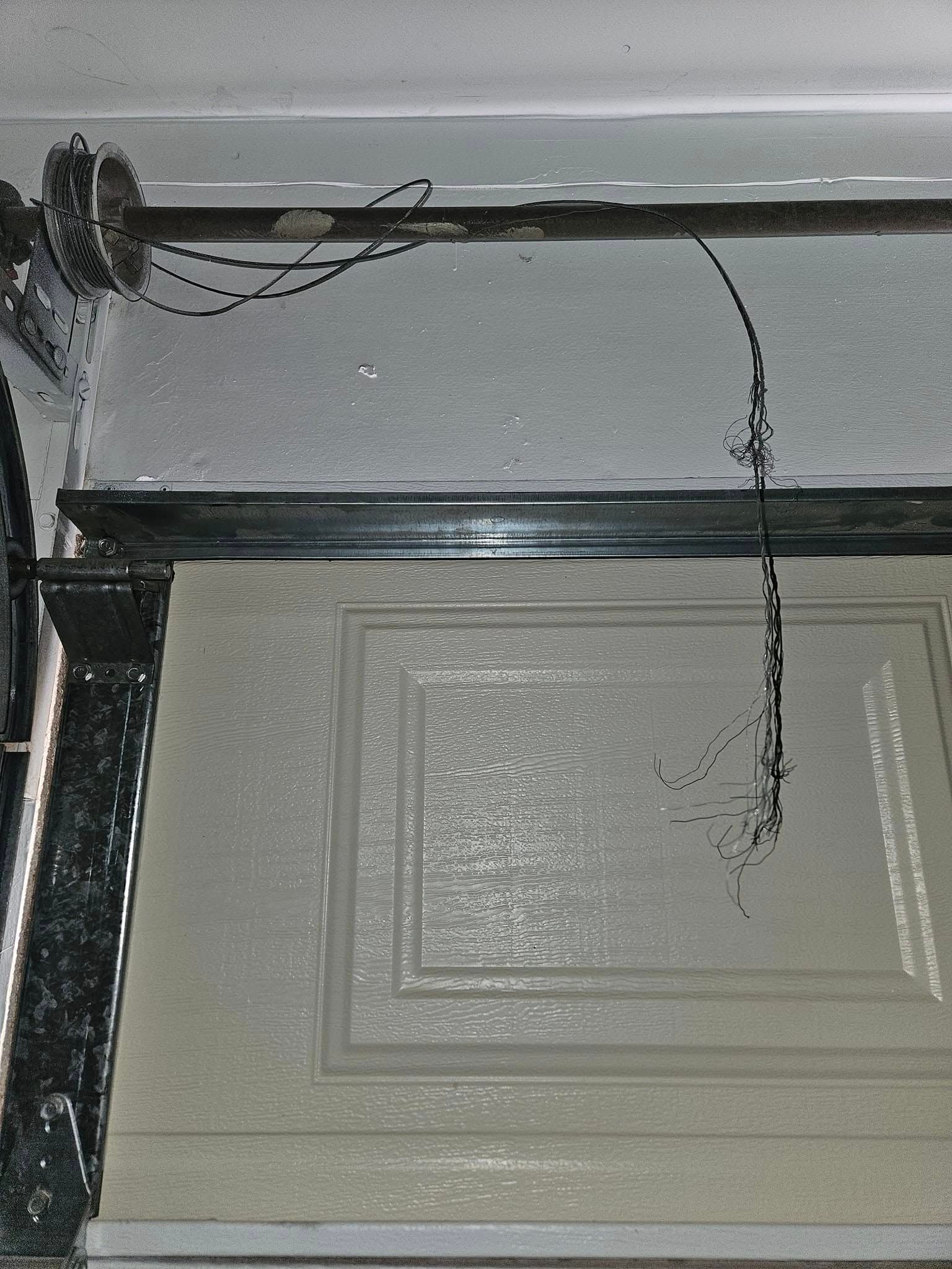 A door with a broken chain hanging from it