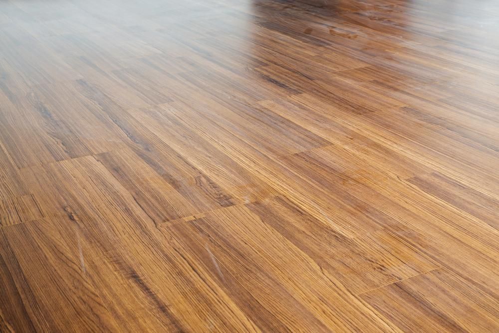 A Close Up of a Wooden Floor in a Room — Alan Aldridge Floor Sanding in Hervey Bay, QLD